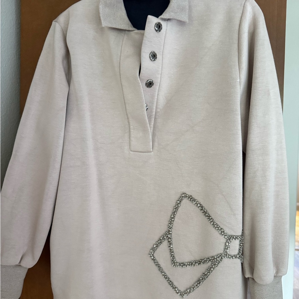 Elegant Cream Sweater with Embellished Detail